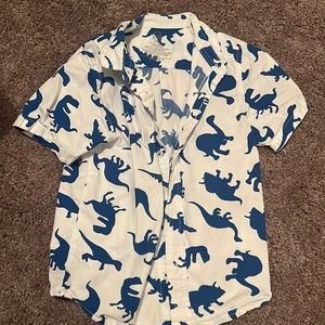 White and blue dinosaur tee